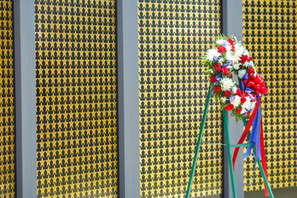 A close-up of one of the star-covered panels of the memorial. Additional stars are planned to be added when the wall makes its Texas stop in Minoela Aug. 6-9.